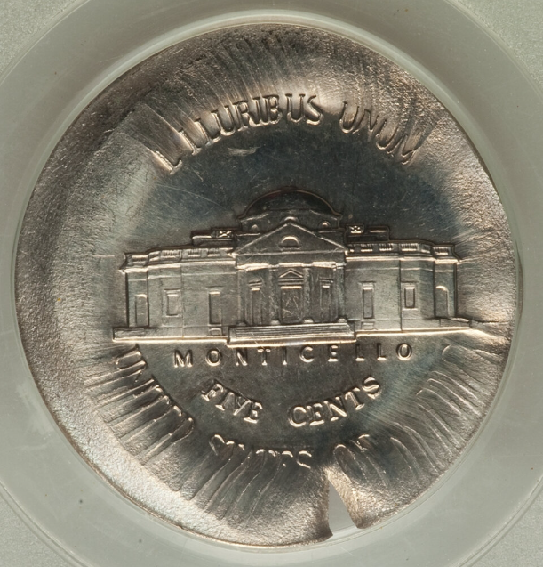 1966 nickel broad strike error showing wider-than-normal diameter, flat rim, and design pressed toward coin edge